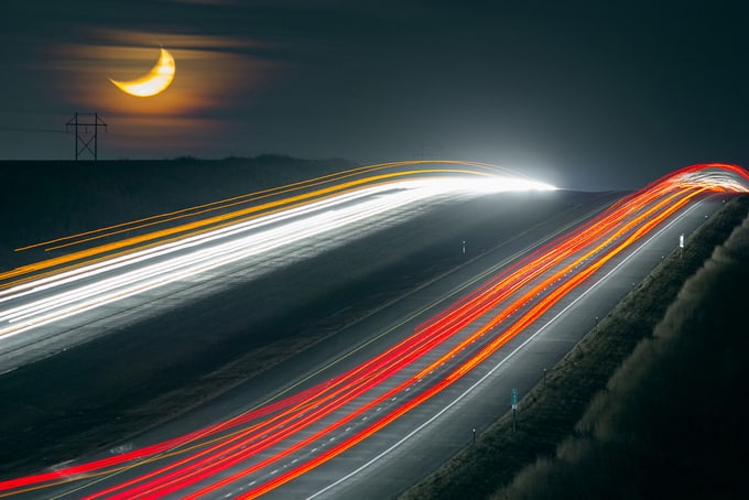 car lights and moon