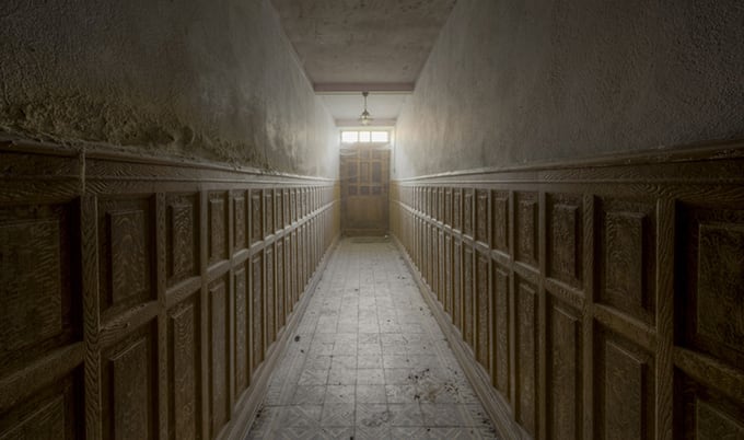 abandoned corridor with door