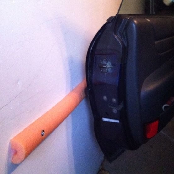 foam noodles in your garage can save your door and the wall.