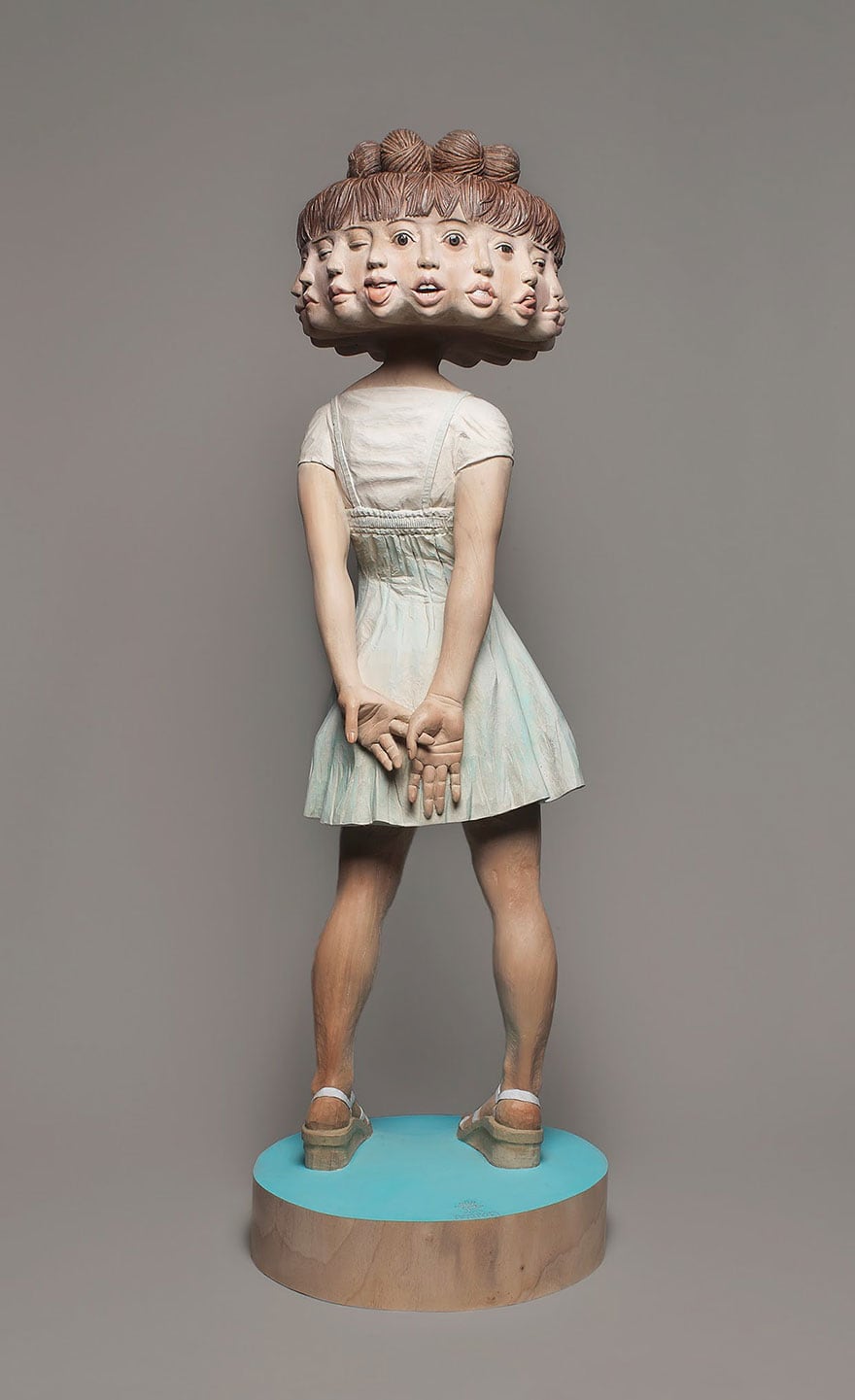 wood-sculptures-of-bizarrely-twisted-characters-by-a-surreal-japanese-artist-10