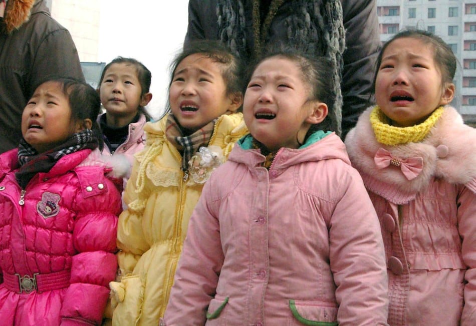 north koreans mourn their deceased leader kim jong-il in pyongyang december 27, 2011. (photo by reuters/kcna) 