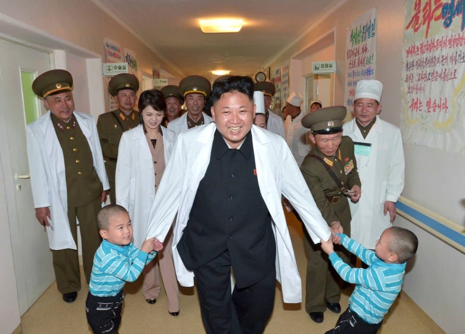 north korean leader kim jong un plays with children during a visit to the taesongsan general hospital in pyongyang may 19, 2014. (photo by reuters/kcna)