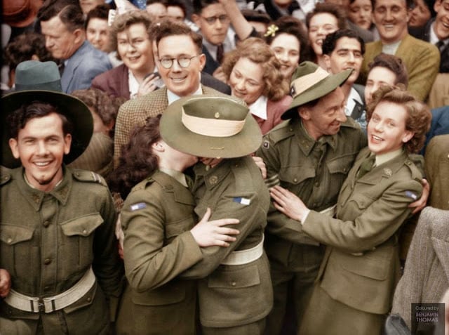 australian soldiers mingle with a section of the crowd gathered in martin place during the victory in the pacific celebrations, sydney, 15 august 1945. (colorized and researched by benjamin thomas from australia)