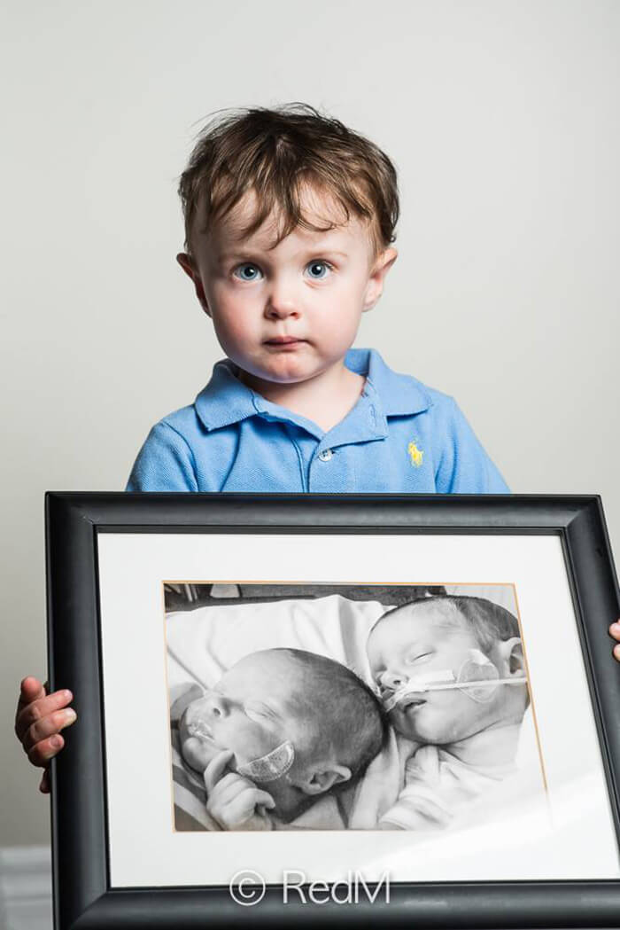 noah, born at 32 weeks. his twin sister victoria, left in the framed picture, died after living 1 month
