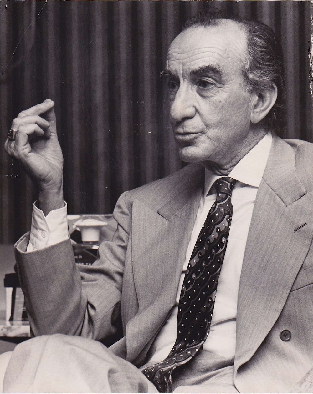a man wearing a suit and tie