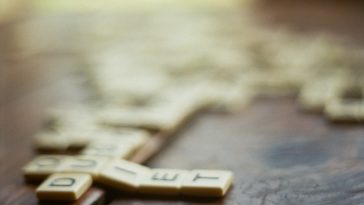 shallow focus photography of scrabble pieces