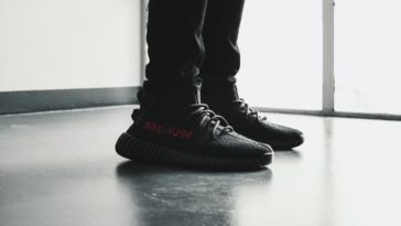 pair of black adidas yeezy boost 350 v2