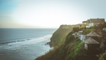 aerial photography of house on mountain cliff during daytime