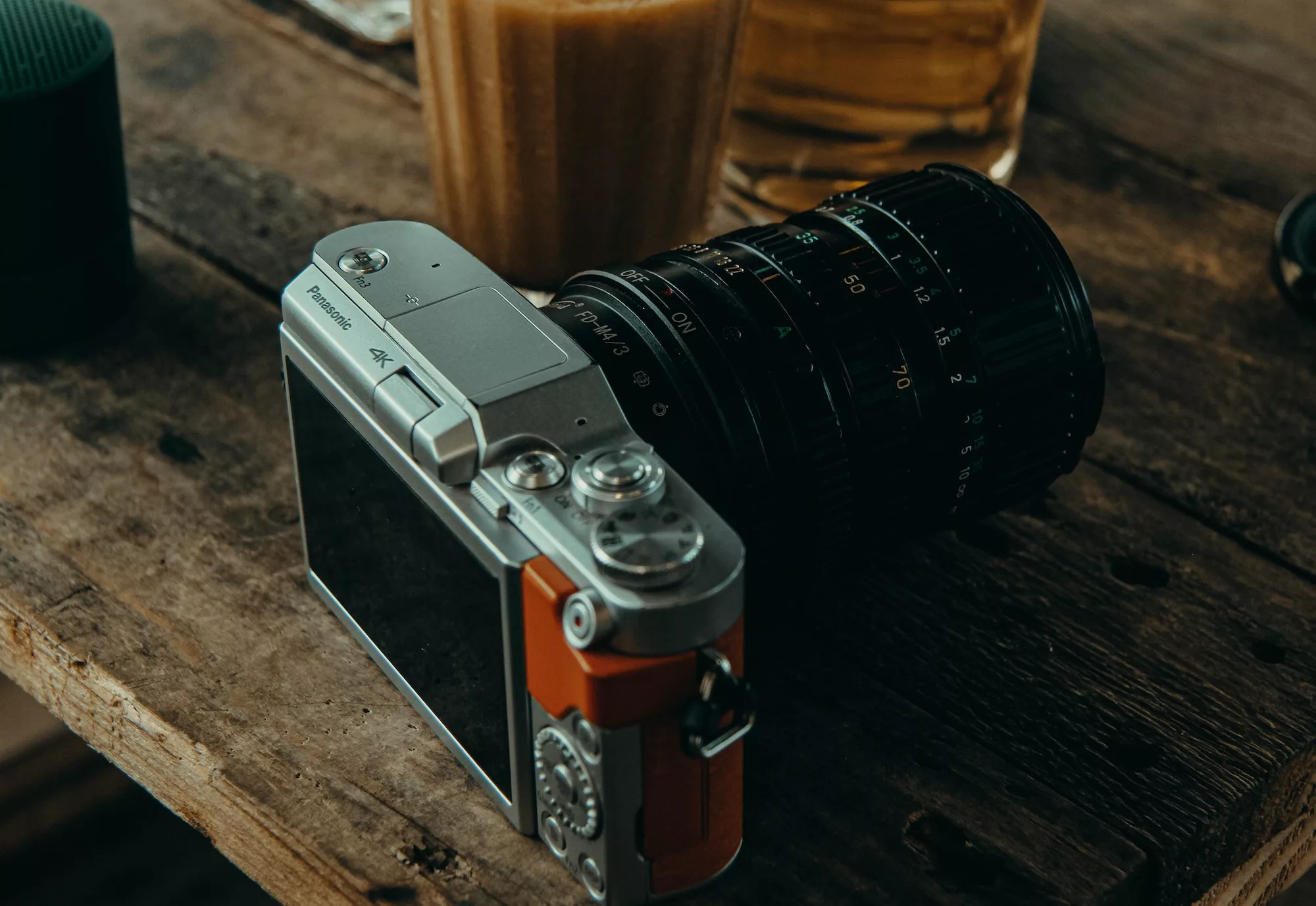dslr camera on a wooden surface