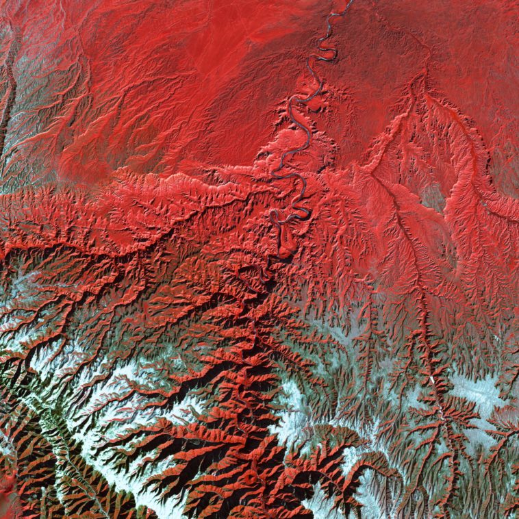 a satellite image of a red mountain range