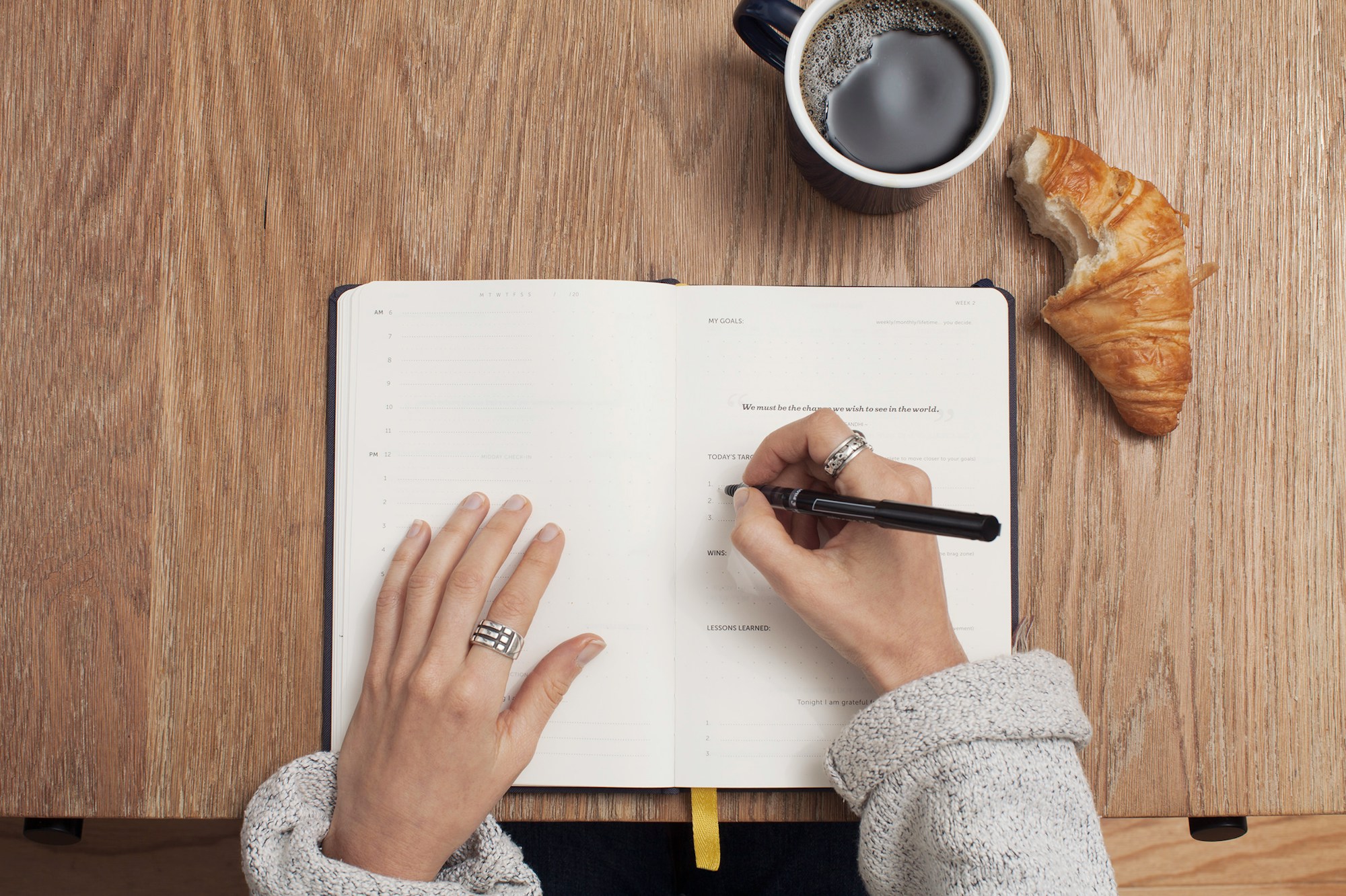 Economical Elegance: The Traveller’s Guide to Cost-Effective Airport Accommodations person writing on a book