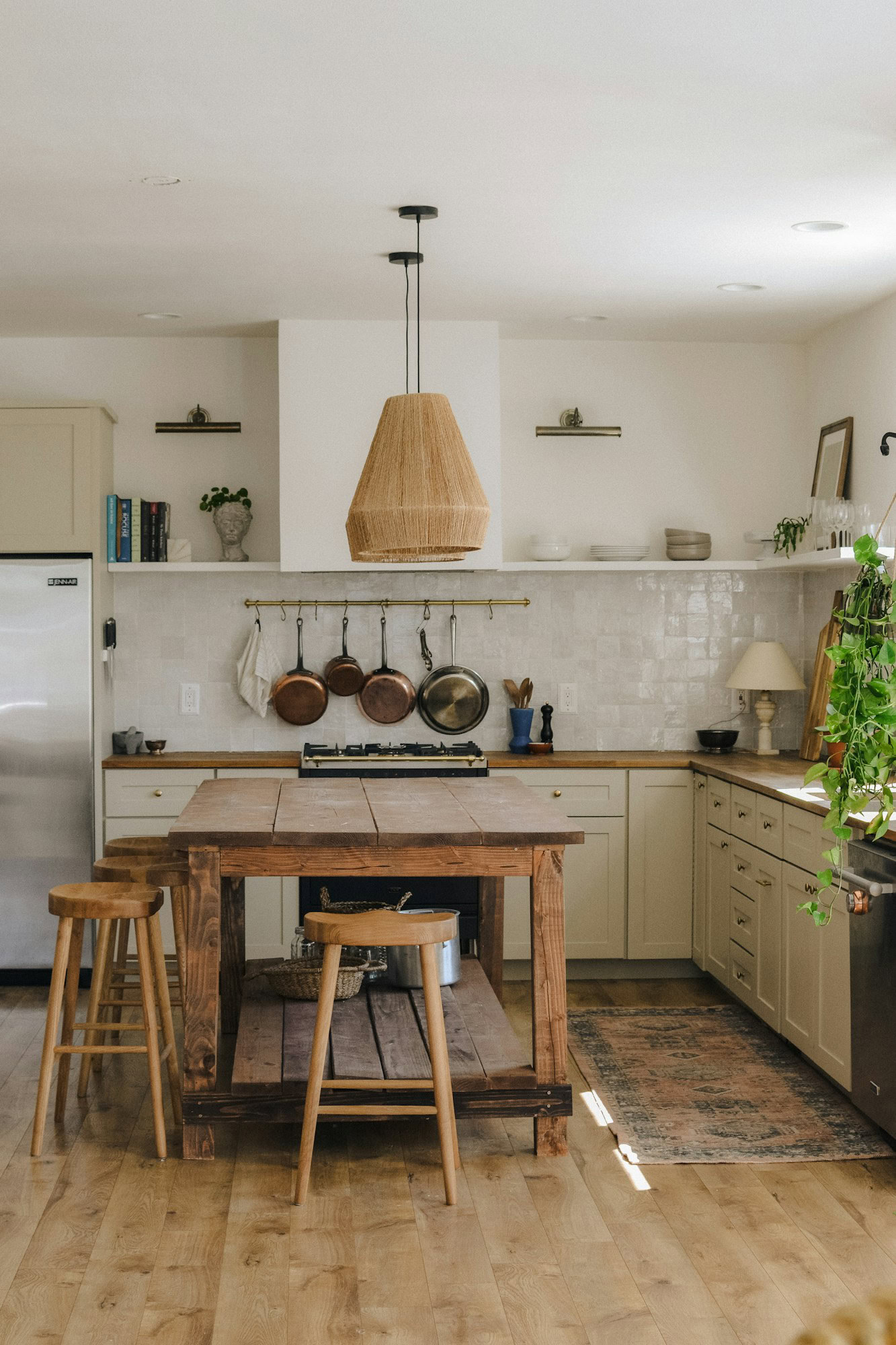 Rustic Charm: How to Design a Farmhouse-Style Dining Room brown wooden seat beside white wooden kitchen cabinet