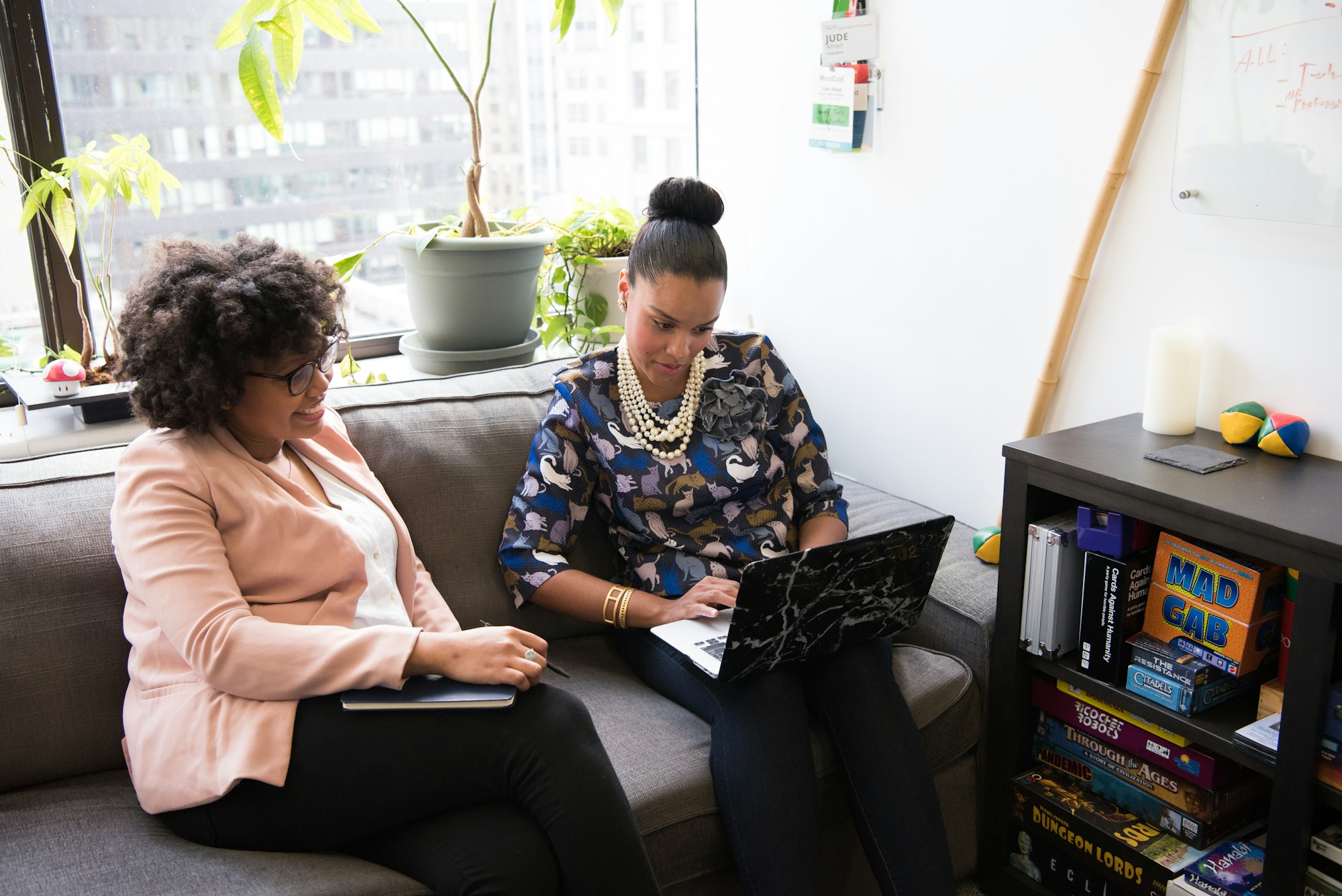 5 Tips To Help You Streamline Patient Communication two woman siting on sofa inside room