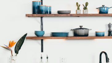 blue ceramic dinnerware on rack