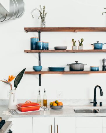 blue ceramic dinnerware on rack