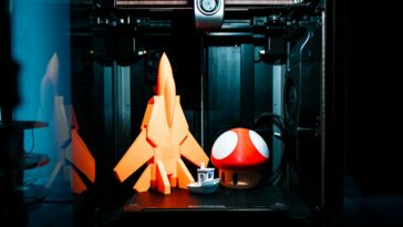 a small 3d printer sitting on top of a table